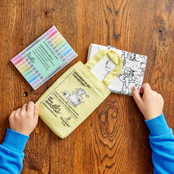 peter rabbit placemat folded and placed in yellow carry bag