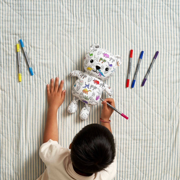 child colouring in artie dinosaur bear