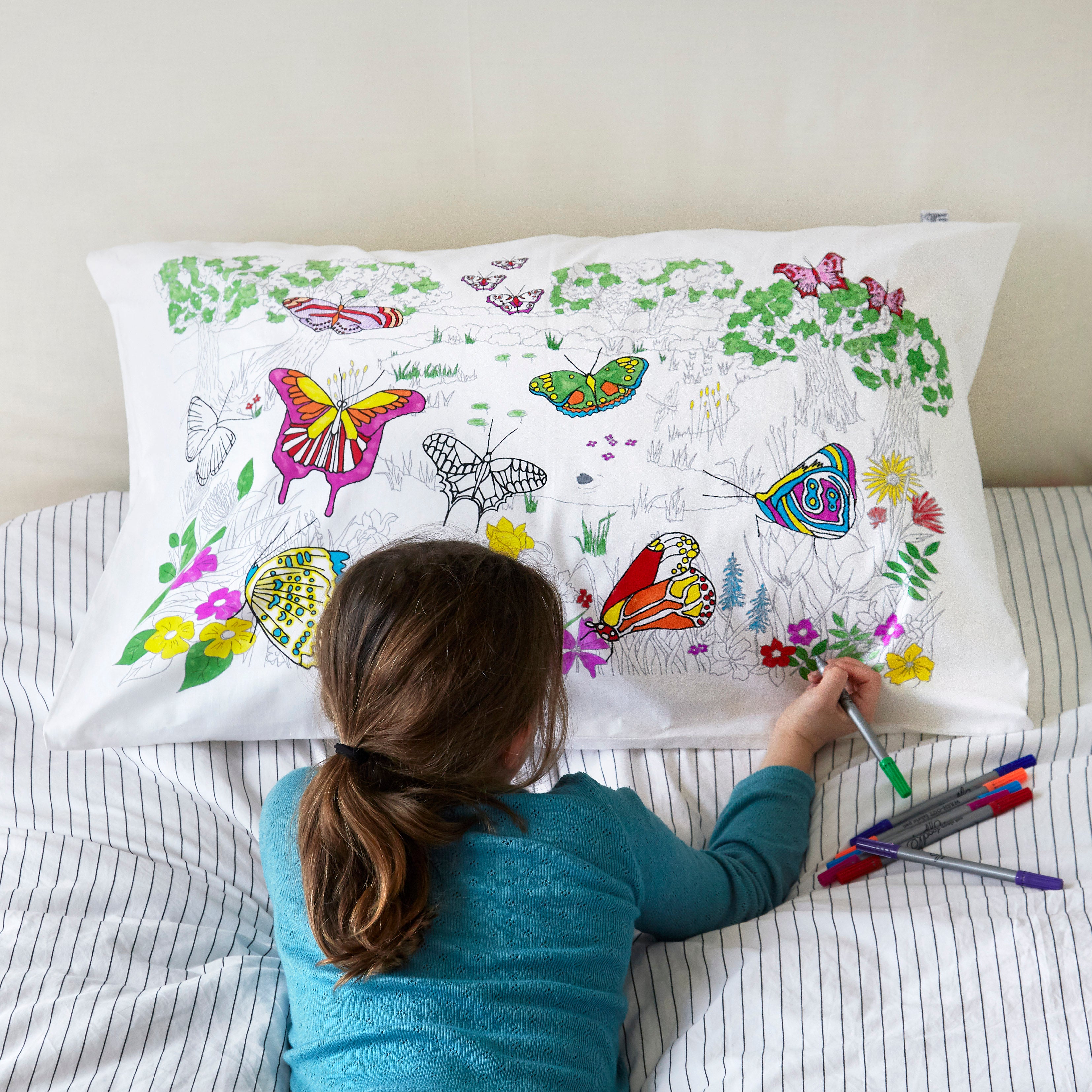 Colour in cushion cover with pens top