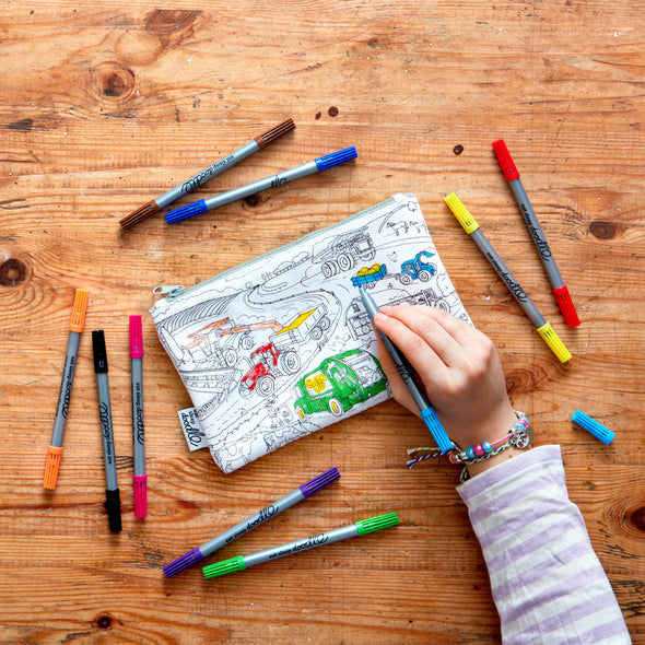 child colouring in farmyard pencilcase