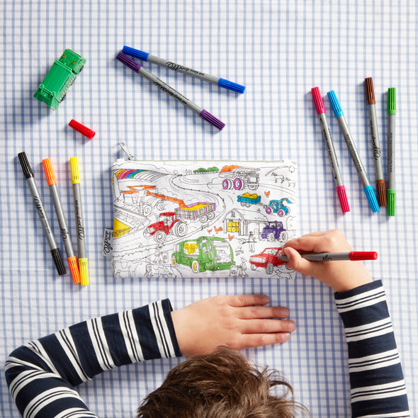 boy colouring in farmyard pencil case
